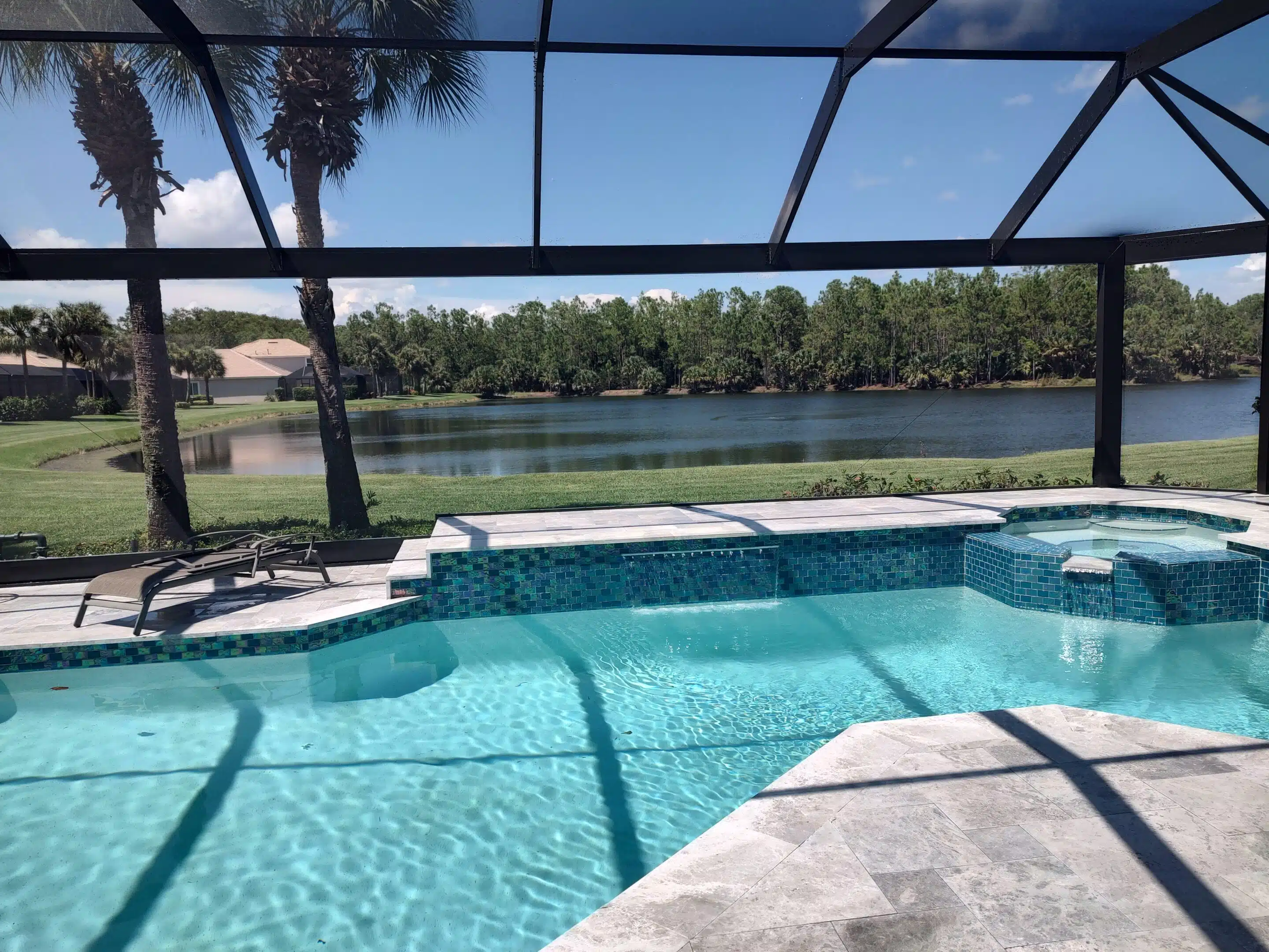 Why Cape Coral Canal Homes Are Switching to Picture Window Pool Cages